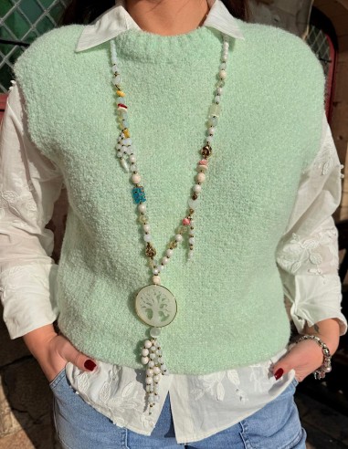 Pull sans manche doux en bouclette...