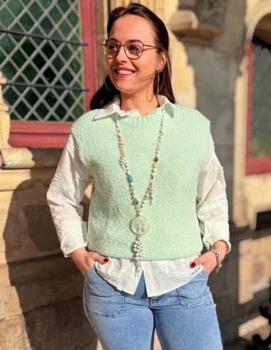 Pull sans manche doux en bouclette...